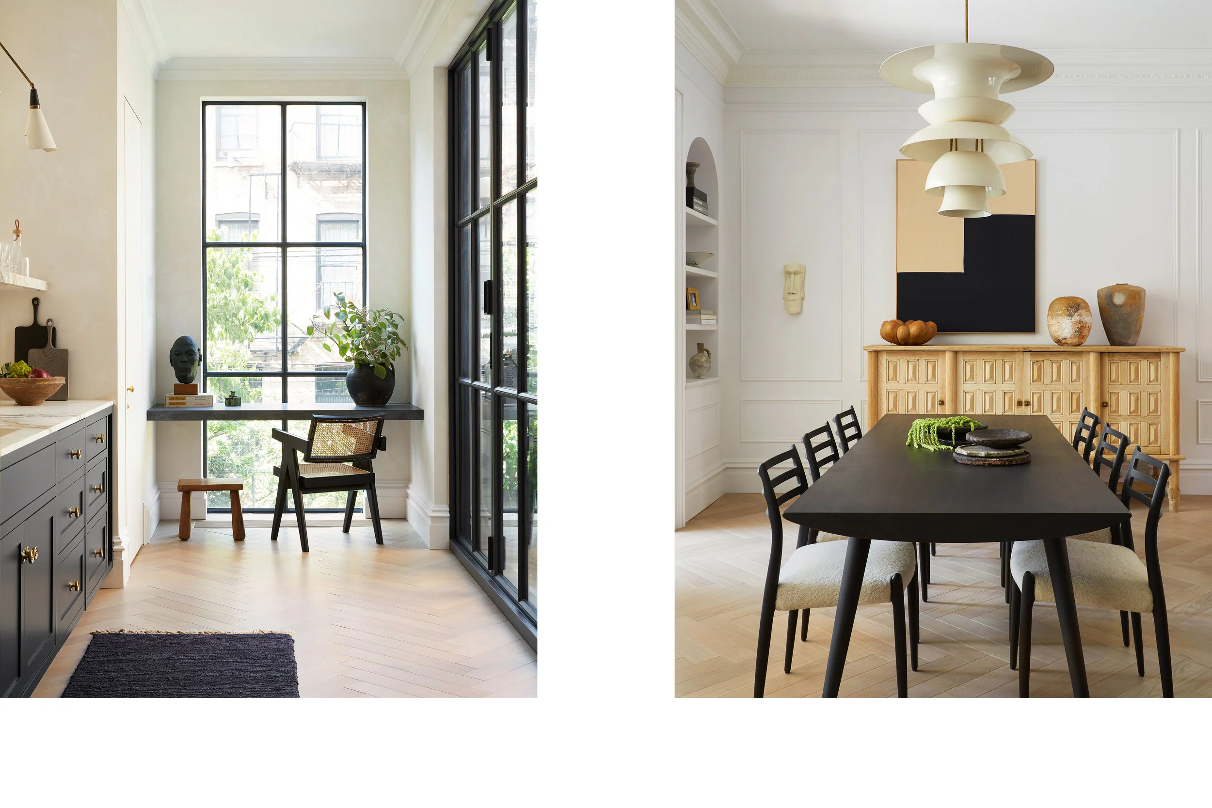 This split view pairs the kitchen window niche and desk chair on the left with the dining room on the right, where a long black table, black dining chairs, a carved light-wood sideboard, and a sculptural cream pendant sit on pale oak herringbone flooring.